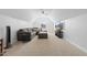 Bonus room with sectional sofa and large screen TV at 139 Red Angus Dr, Smithfield, NC 27577