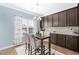Breakfast nook with a table and chairs, adjacent to the kitchen at 139 Red Angus Dr, Smithfield, NC 27577