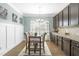 Cozy dining area with table and chairs near kitchen and cabinets at 139 Red Angus Dr, Smithfield, NC 27577