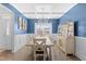 Bright dining room featuring a large table, chandelier, and built-in hutch at 139 Red Angus Dr, Smithfield, NC 27577