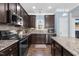 Modern kitchen with granite countertops and stainless steel appliances at 139 Red Angus Dr, Smithfield, NC 27577