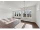 Spacious dining area with hardwood floors and large windows at 1427 Goldsboro Ave, Sanford, NC 27330