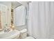 Clean bathroom with white vanity, shower/tub combo, and white linen at 1606 Rosetta Dr, Durham, NC 27701