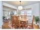 Spacious dining room with hardwood floors and a view of the living room at 1606 Rosetta Dr, Durham, NC 27701