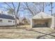 Detached single-car garage with large concrete driveway at 1606 Rosetta Dr, Durham, NC 27701