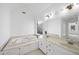 Spa-like bathroom with double vanity and jetted tub at 1800 Deer Fern Dr, Raleigh, NC 27606