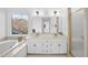 Bathroom with double vanity, jetted tub, and shower at 1800 Deer Fern Dr, Raleigh, NC 27606
