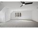 Bright bedroom featuring a ceiling fan and window at 1800 Deer Fern Dr, Raleigh, NC 27606