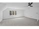 Spacious bedroom with carpeted floor and large window at 1800 Deer Fern Dr, Raleigh, NC 27606