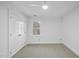 Bright bedroom with double doors and ceiling fan at 1800 Deer Fern Dr, Raleigh, NC 27606