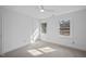 Spacious bedroom with two windows and ceiling fan at 1800 Deer Fern Dr, Raleigh, NC 27606