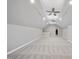 Spacious bonus room with carpeting and ceiling fan at 1800 Deer Fern Dr, Raleigh, NC 27606