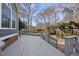 Spacious deck overlooks a wooded area, perfect for outdoor entertaining at 1800 Deer Fern Dr, Raleigh, NC 27606