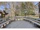 Deck area with wooden benches and pergola at 1800 Deer Fern Dr, Raleigh, NC 27606