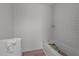 Simple bathroom with subway tile and new flooring at 1917 Faucette Ave, Durham, NC 27704