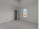 Simple bedroom with large windows and ample natural light at 1917 Faucette Ave, Durham, NC 27704