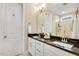 Bathroom boasts double sinks and a large mirror at 1920 Trent River Ave, Wake Forest, NC 27587