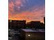 Breathtaking sunset view showcasing vibrant colors over city buildings at 200 S Dawson St # 209, Raleigh, NC 27601