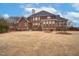 Large backyard with brick home and sunroom at 2008 Joelene Dr, Rocky Mount, NC 27803