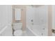 Clean bathroom featuring a bathtub, toilet and a wall-mounted towel rack at 2008 Joelene Dr, Rocky Mount, NC 27803