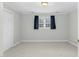 Simple bedroom with neutral walls and carpet at 2008 Joelene Dr, Rocky Mount, NC 27803