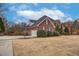 Brick home with attached garage and manicured lawn at 2008 Joelene Dr, Rocky Mount, NC 27803