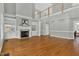Two-story living room with hardwood floors and fireplace at 2008 Joelene Dr, Rocky Mount, NC 27803