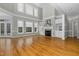 Two-story living room with hardwood floors and fireplace at 2008 Joelene Dr, Rocky Mount, NC 27803