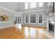 Two-story living room with hardwood floors and fireplace at 2008 Joelene Dr, Rocky Mount, NC 27803