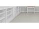 Built-in shelving and small desk in office at 2008 Joelene Dr, Rocky Mount, NC 27803