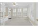Bright sunroom with built-in cabinetry and plantation shutters at 2008 Joelene Dr, Rocky Mount, NC 27803
