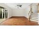Spacious basement with hardwood floors, sliding glass doors and staircase at 219 Broadgait Brae Rd, Cary, NC 27519