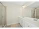 Bathroom with double vanity and soaking tub at 219 Broadgait Brae Rd, Cary, NC 27519