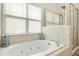 Bathroom features a soaking tub and walk-in shower at 219 Broadgait Brae Rd, Cary, NC 27519