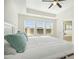 Bright bedroom with large windows and en-suite bathroom access at 219 Broadgait Brae Rd, Cary, NC 27519