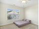 Bright bedroom with large window and plush carpet at 219 Broadgait Brae Rd, Cary, NC 27519