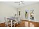 Dining room with hardwood floors and access to balcony at 219 Broadgait Brae Rd, Cary, NC 27519