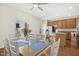 Kitchen and dining area with hardwood floors at 219 Broadgait Brae Rd, Cary, NC 27519