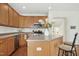 Modern kitchen with stainless steel appliances and an island at 219 Broadgait Brae Rd, Cary, NC 27519