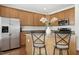 Kitchen features stainless steel appliances and breakfast bar at 219 Broadgait Brae Rd, Cary, NC 27519
