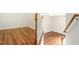 Landing area with hardwood floors and a view of the staircase at 219 Broadgait Brae Rd, Cary, NC 27519