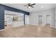 Open concept living area with a modern kitchen and hardwood floors at 2305 Ashe St, Durham, NC 27703