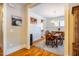 Spacious dining room with hardwood floors and a large chandelier at 2494 Briar Chapel Pkwy, Chapel Hill, NC 27516