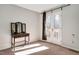 Bright bedroom with double doors leading to a balcony at 250 S Estes Dr # 53, Chapel Hill, NC 27514