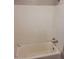 Simple bathroom with a bathtub and shower at 2607 Vineyard St, Durham, NC 27707