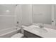 Bright bathroom featuring a tub, toilet and granite counter tops at 284 Chesapeake Commons St # 150, Garner, NC 27529