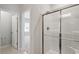 Bathroom with glass enclosed shower and tiled floors at 284 Chesapeake Commons St # 150, Garner, NC 27529