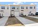 View of new construction townhomes with attached garages at 288 Chesapeake Commons St # 149, Garner, NC 27529
