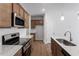 Modern kitchen featuring stainless steel appliances and white subway tile backsplash at 288 Chesapeake Commons St # 149, Garner, NC 27529