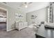 Neutral Bedroom with crib and changing table at 3534 Cashew Dr, Raleigh, NC 27616